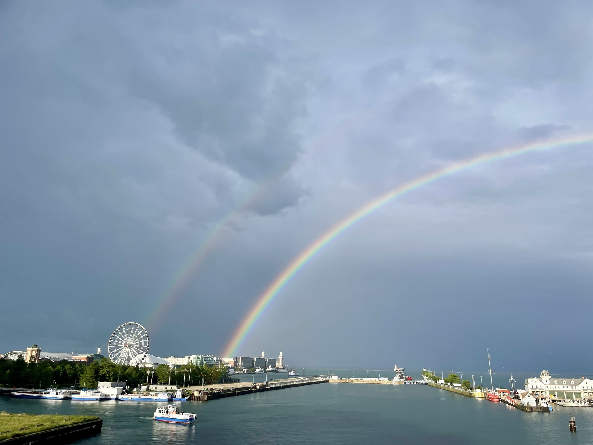 A rainbow above Chicago’s harbor and skyline.