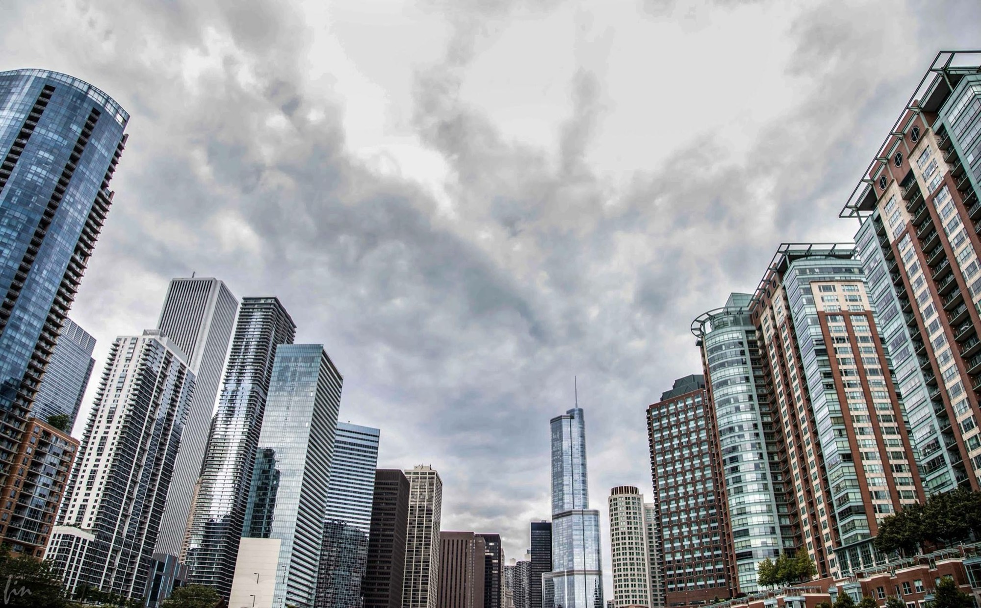 Chicago towers beneath clouds.